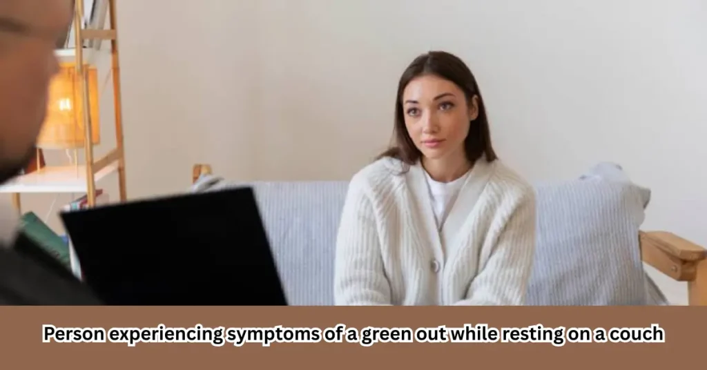 Person experiencing symptoms of a green out while resting on a couch (1)