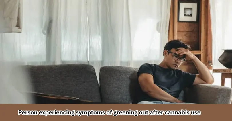 Person experiencing symptoms of greening out after cannabis use